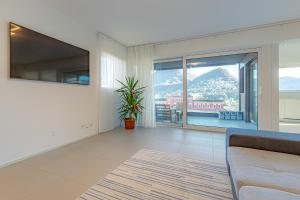 IMPERIAL of LUGANO 3 with a lake view behind the station and 10 min from the lake of Lugano
