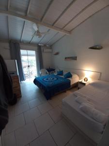 OLHO GREGO Hospedagem em ARRAIAL dAJUDA