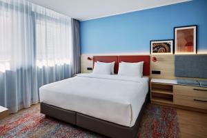 One-Bedroom Apartment with Balcony room in Four Points by Sheraton München Central