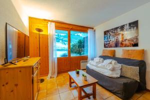 Appartements Appartement RDC Prarion ski in - ski out - Happy Rentals : photos des chambres