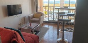 Appartements Au village studio vue mer : photos des chambres