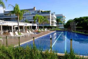 Essence Life Residence com Vista Mar, apartamento completo com 2 quartos em Condomínio Clube a 100 metros da Praia do Campeche, Florianópolis