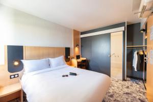 Hotels B&B HOTEL Lyon Eurexpo Bron : photos des chambres