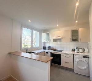 Appartements Appart Laffitte joli T2 au coeur du parc & parking & RER pour Paris & La Defense : photos des chambres