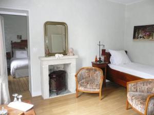 B&B / Chambres d'hotes Les Lilas de Bellefontaine : photos des chambres