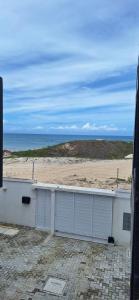 Pé na areia Cumbuco