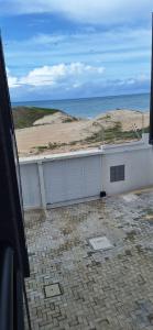 Pé na areia Cumbuco