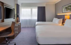 Standard Room with Two Queen Beds and Sofa Bed room in DoubleTree by Hilton Edinburgh Airport