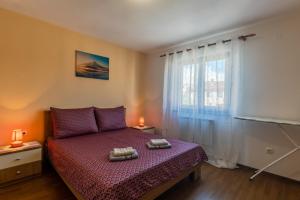 Apartments with parking space Porec - 22124