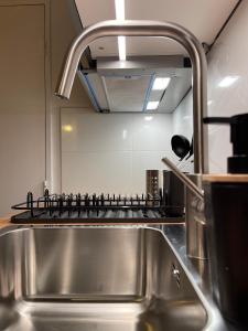 Appartements T2D Apartment - Suite TVR proche Disneyland Paris : photos des chambres