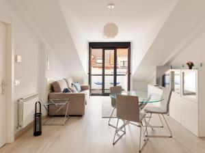 Ático con terraza en playa de San Lorenzo