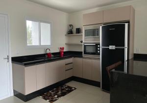 Villa Kalani, Casa 03. Na quadra do mar