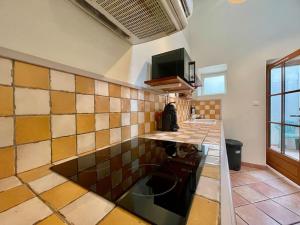 Appartements La Traverse - au pied de la Cite Medievale - Clim et terrasse : photos des chambres