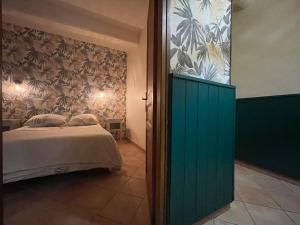 Appartements La Traverse - au pied de la Cite Medievale - Clim et terrasse : photos des chambres