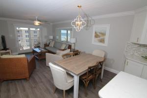 Visit this top floor property located on the no-drive beach with 2 complex pools!