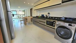 Apartamento de luxo à beira-mar