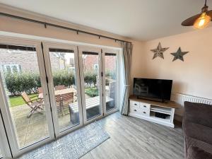 The Sandpiper - Part of the The Bay Filey Holiday Village with pool, gym and direct beach access, pub, restaurant, tennis and meadows walks