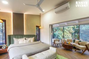 StayVistas House Of J - Embrace Leisure with Lawn, Pool, and Gazebo