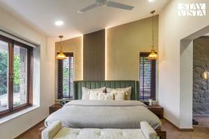 StayVistas House Of J - Embrace Leisure with Lawn, Pool, and Gazebo