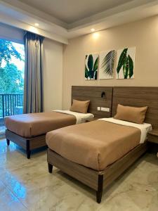 Flock Hotel I Golf Course Road Near Dlf Phase 1 Metro station I Gurugram