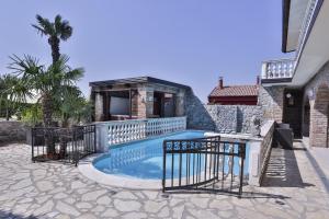 Deluxe Quadruple Room with Terrace and Sea View room in Casa Oasa