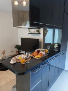 Appartements The Heynyss'Grace : photos des chambres