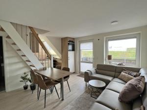 Deichblick 6 in Norddeich- Urlaub mit Meerblick am Strand