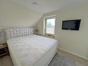 Deichblick 6 in Norddeich- Urlaub mit Meerblick am Strand