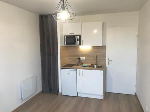 Appartements IKIZEN - Arena Confort - Boulingrin : photos des chambres
