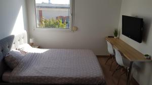 Appartements IKIZEN - Arena Confort - Boulingrin : photos des chambres