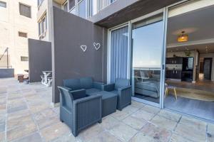 Infinity Sunset Beachfront Apartment