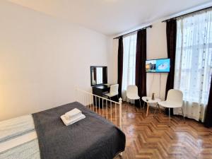 Studio room in Main Square Apartments & More