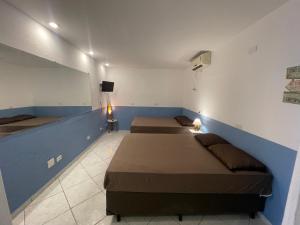 Remar Suítes 02 - Com ar condicionado, na melhor localização do Guarujá e pertinho da praia!