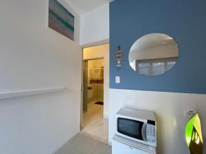 Remar Suítes 03 - Melhor localização do Guarujá, perto da praia e com ar condicionado!