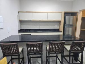 Flat Amarilis em Riviera de São Lourenço, Completo, com Serviço de Hotelaria, Enxoval e Arrumação