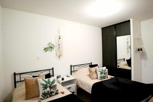 Appartements Appartement Le Moderne Ideal pour Couples et Professionnels : photos des chambres