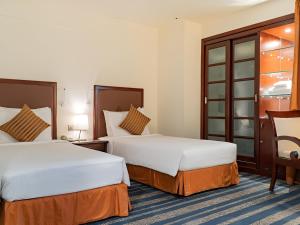 Standard Twin Room room in Al Ain Palace Hotel Abu Dhabi