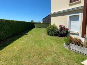 Appartements Le Jardin de Blonville - A 10 min a pied de la plage - tennis & equitation a cote : photos des chambres