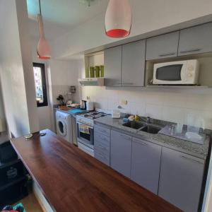 MONROE SUITES con cochera