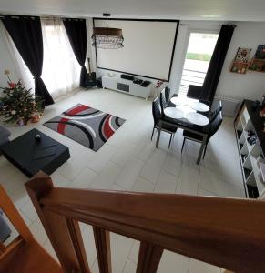 Appartements Duplex proche Disney avec ecran cinema : photos des chambres