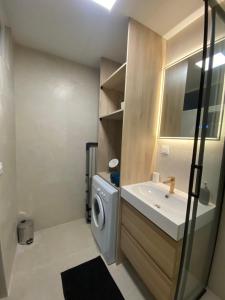 Appartements La petite maison de Couilly-Pont-aux-Dames : photos des chambres
