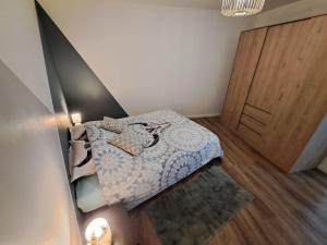 Appartements T3 Le Ptit Bosco au bord du lac de Serre-Poncon : photos des chambres