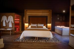 Villas * L’Eden * Maison romantique avec balneo et sauna : photos des chambres