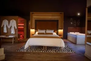 * L’Eden * Maison romantique avec balnéo et sauna - Le Temple