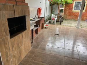 Casas de Veraneio em Torres com Terreno Compartilhado - Lateral