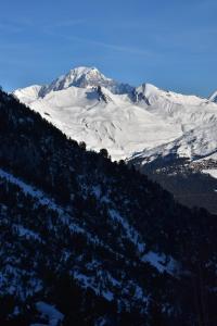 Arcs 1950 Appartement Luxe type chalet 5 à 7 personnes Vue imprenable sur le Montblanc skis aux pieds