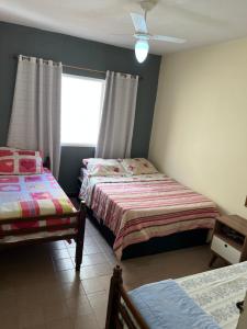 Apt TOTA 3 min Praia grande piscina e churrasqueira