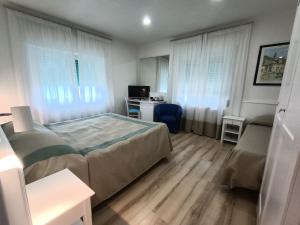Dreibettzimmer mit Meerblick
