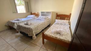 Casa com varanda, 2 quartos, wi-fi, próximo ao centro da cidade