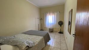 Ap com terraço, 2 quartos, wi-fi, próximo ao centro da cidade